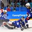 GANGNEUNG, SOUTH KOREA - FEBRUARY 22: Canada's Marie-Philip Poulin #29 (not shown) gets the puck past USA's Maddie Rooney #35 to score a second period goal with Hannah Brandt #20 and Lee Stecklein #2 looking on during gold medal round action at the PyeongChang 2018 Olympic Winter Games. (Photo by Matt Zambonin/HHOF-IIHF Images)

